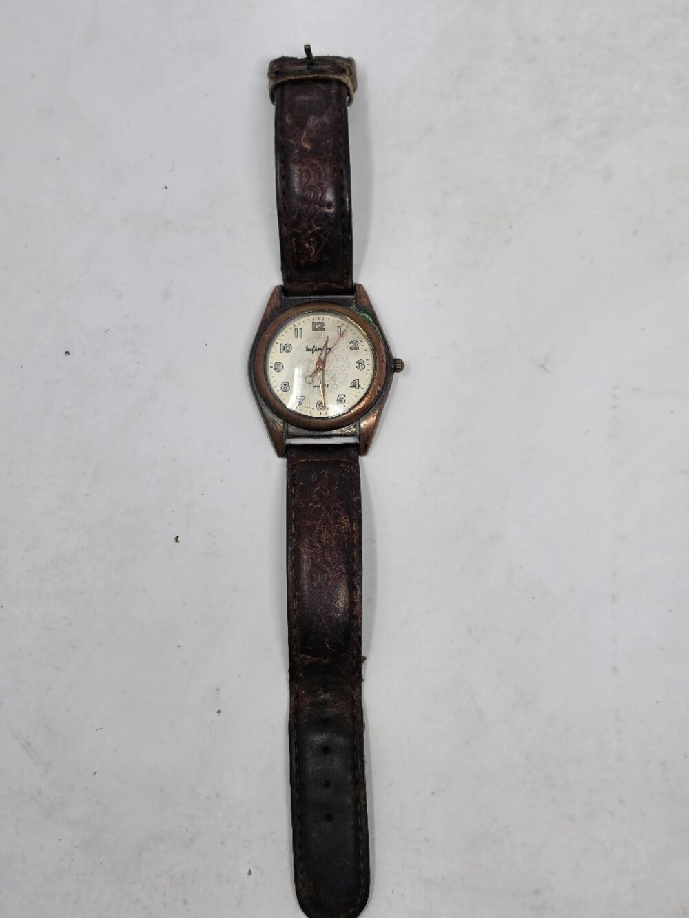 Infinity Quartz Wristwatch White Dial Stainless Steel Back Brown Strap